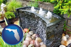 florida map icon and bubbling water feature in a landscape