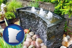 minnesota map icon and bubbling water feature in a landscape