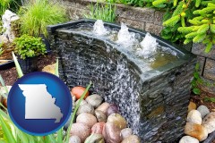 missouri map icon and bubbling water feature in a landscape