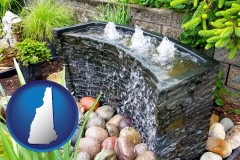 new-hampshire map icon and bubbling water feature in a landscape