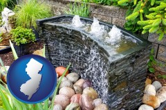 new-jersey map icon and bubbling water feature in a landscape