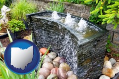 ohio map icon and bubbling water feature in a landscape
