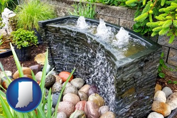 bubbling water feature in a landscape - with Indiana icon